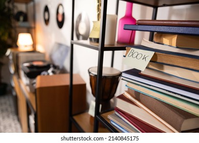 A Shelf Full Of Books With One Sticky Note That Says Book. Learning A New Language. Room Full Of Stuff. Modern Teenager Room.