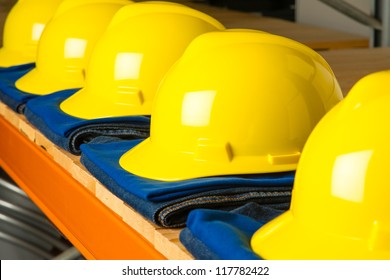 Shelf With A  Row Of Clean Clothing For The Working Class