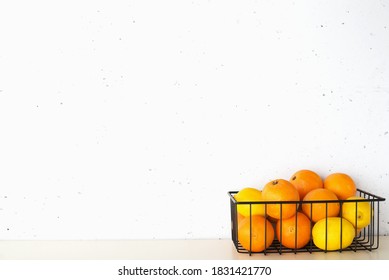 Shelf In A White Kitchen With Fresh Fruits, Herbs, Cutlery, Kitchen Utensils, Tools, Textiles, Fresh Water In A Decanter. Home, Family, Simplicity