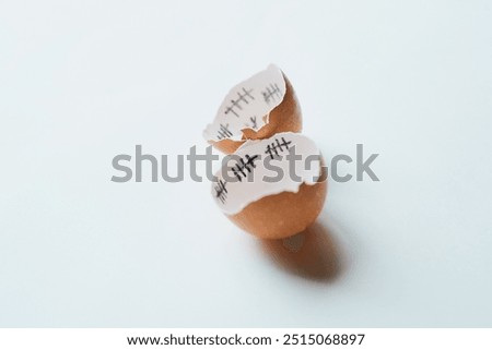 Shell, broken or eggs with tally counting days for fertility, healthy protein or conception in studio. White background, mockup space or birthdate marks for calculating ovulation or pregnancy date