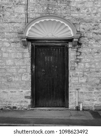 Shell Door Pediment In Black And White Tone, Shallow Depth Of Field Vertical Photography