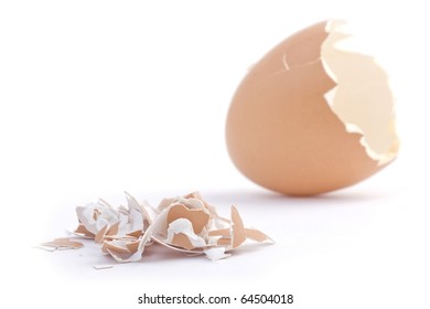 Shell Of The Egg. Isolated On White Background. Focus On Smaller Pieces.