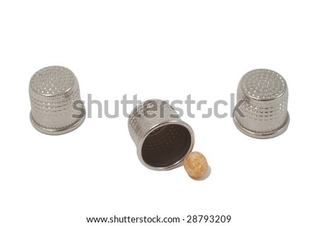 A shell game: three thimbles and a pea