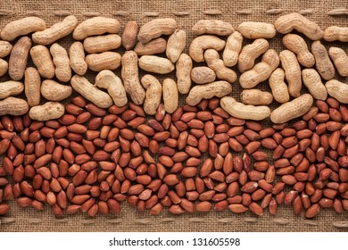 Shelled and unshelled peanuts lying on sackcloth can use as background