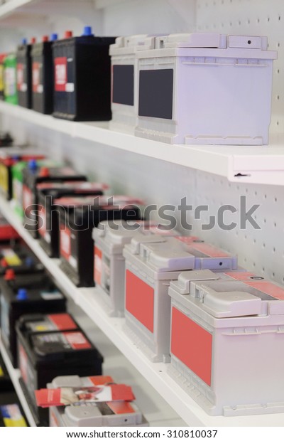 shelves in an\
auto parts store with storage\
cells