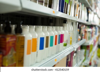 Shelves With Different Hair Care Products In  Salon 