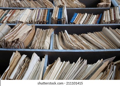 Shelves Full Of Files In A Messy Old-fashioned Archive