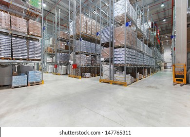 Shelves With Goods In Distribution Center Warehouse