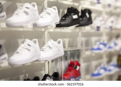 shelves with shoes in a sporting goods store