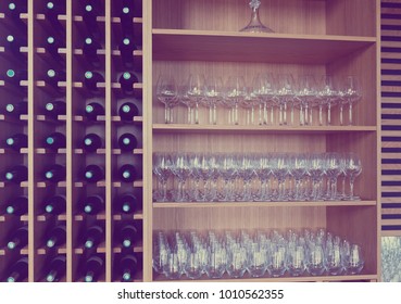  Shelves With Wine Bottles And Wineglasses At  Cafe Or Bodega