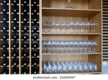  Shelves With Wine Bottles And Wineglasses At  Cafe Or Bodega