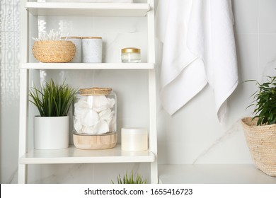 Shelving unit with toiletries in bathroom interior - Shutterstock ID 1655416723