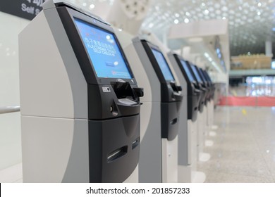 SHENZHEN - APRIL 16: self check-in kiosks on April 16, 2014 in Shenzhen, China. Shenzhen Bao'an International Airport is located near Huangtian and Fuyong villages in Bao'an District, Shenzhen