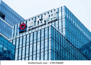 SHENZHEN, CHINA - AUGUST 08, 2019: China Evergrande Group icon on office building wall.