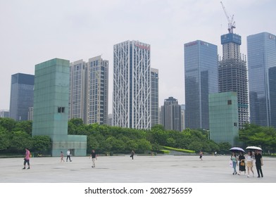 Shenzhen, China.  August 19, 2018. People Walking Around The Shopping Park District Of Shenzhen China On An Overcast Day. 