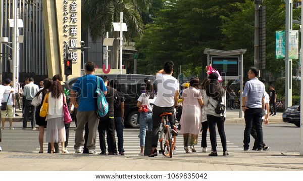 SHENZHEN, CHINA - CIRCA APRIL 2018 : FACIAL
RECOGNITION TECHNOLOGY at street to identify jaywalkers and
automatically issue them fines by text.  Offenders faces are
displayed on screens at
crossings.