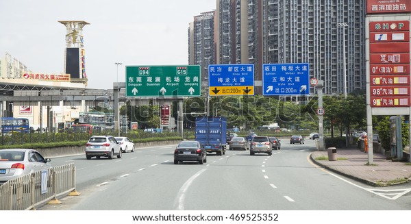 Shenzhen, China - Jun 13, 2016: Traffic at rush\
hour on a busy street of Shenzhen after work. Shenzhen together\
with Shanghai and Tianjin are cities that car ownership exceeds 2\
millions.