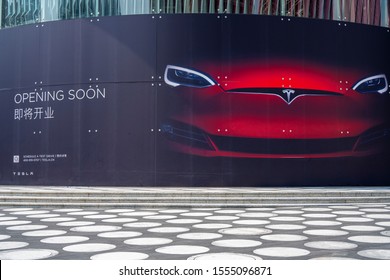 Shenzhen, China. October, 2019. Tesla Is Coming Soon At ONE AVENUE. Tesla Specializes In Electric Car Manufacturing And, Through Its SolarCity Subsidiary, Solar Panel Manufacturing.