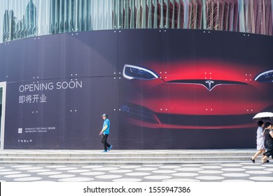 Shenzhen, China. October, 2019. Tesla Is Coming Soon At ONE AVENUE. Tesla Specializes In Electric Car Manufacturing And, Through Its SolarCity Subsidiary, Solar Panel Manufacturing.