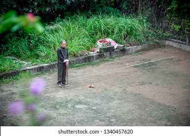 Shenzhen, China - September 2018: : Elderly People Playing Croquet In A Park With Friends. Activities For Older Chinese Generation. Asian Seniors Lifestyle