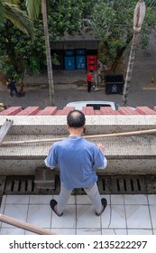 Shenzhen, Guangdong, China - 14 Mar 2022: A Shenzhen Resident Is Standing   On His Apartment Balcony. All Residents Are Required To Follow  Quarantine Policies Starting From 14-Mar-2022.