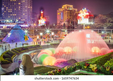 Shenzhen, Guangdong Province, China 11/12/2014. View Of The Metro Station Window Of The World. Central Entrance To The Park Window Of The World. Evening, Lights, Fountain.