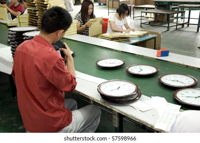 SHENZHEN - MAY 7: Shenzhen Clock Factory, Almost All World's Clock Are Made In Shenzhen, Factory Tour On MAY 7, 2010 In Shenzhen.