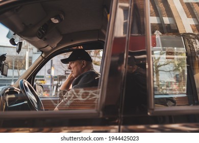 Shepherd's Bush, London | UK -  2021.03.22: London Cab Driver Waiting For A Passengers