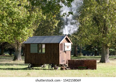 Shepherds Hut With Smoking Chimney
