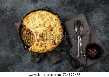 shepherd's pie. Minced meat, mashed potatoes and vegetables casserole in cast iron pan. Top view