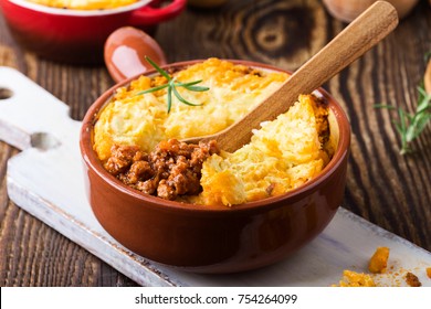 Shepherd's Pie, Traditional British Dish With  Minced Meat And Mashed Potato On Rustic Wooden Table