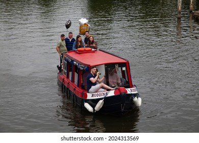 Shepperton UK - 06 10 2021: A Group Of People Having A Party On Board Of A Narrow Boat On The River Thames Near Shepperton Lock.