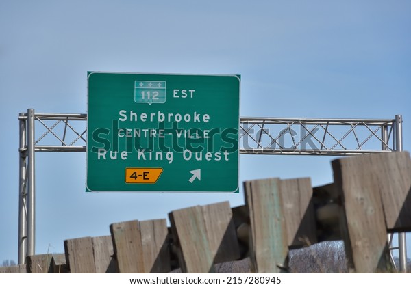 Sherbrooke\
Downtown and Rock Forest Street highway\
sign