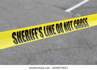 SHERIFF'S LINE DO NOT CROSS. Crime Scene blocked off by law enforcement. Do not cross tape. Part of a Parking Lot closed off for Police and Sheriff Cars and Vans to park and process bad guys. Protest

