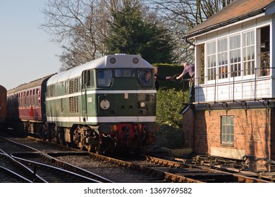 SHERINGHAM, NORFOLK, UK - MARCH 9, 2014: British Rail Class 31 No. D5631 (31207) Passes The Sheringham Signal Box As It Works A Holt To Sheringham To Passenger Service, During NNR's Steam Gala.