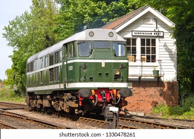 SHERINGHAM, NORFOLK, UK - MAY 26, 2013: Ex British Rail Class 31 No. D5631 (31207) Is Seen Alongside The Sheringham West Signal Box During The North Norfolk Railway's 'Dad's Army Event' Weekend.