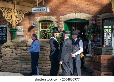 Sheringham, Norfolk, UK - SEPTEMBER 14 2019: People In 1940s Train Conductor Uniforms At Sheringham Train Platform During 1940s Weekend