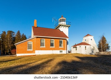 Sherwood Point Lighthouse at the entrance to Sturgeon Bay, Lake Michigan in Door County, Wisconsin.  Lighthouse is located in the town of  Idlewild.
