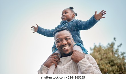 Shes always going to be my little princess. Portrait of a father carrying his daughter on his shoulders outdoors. - Powered by Shutterstock