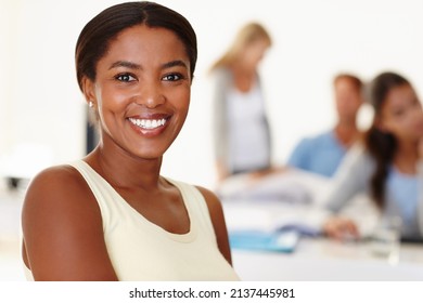 Shes excited to be part of the team. Closeup of a smiling young African woman in a meeting. - Shutterstock ID 2137445981