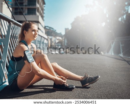 Similar – Happy fit woman taking a break from jogging