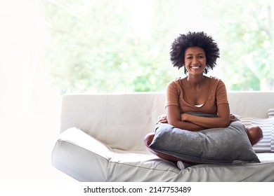 Shes A Home Body. Shot Of A Young Woman Enjoying Some Time Off At Home.