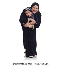 Shes a little angel. Studio portrait of a happy muslim grandmother and granddaughter isolated on white.