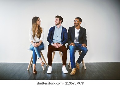 Shes Ready To Make A Great First Impression. Shot Of A Group Of Young Businesspeople Waiting In Line For A Job Interview.