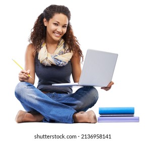 Shes A Straight A Student. Studio Shot Of A Woman Studying On A Laptop Isolated On White.