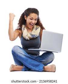 Shes A Straight A Student. Studio Shot Of A Woman Studying On A Laptop Isolated On White.