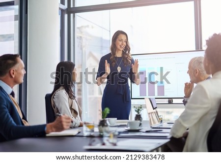 Shes taking the lead in this presentation. Cropped shot of a businesswoman giving a presentation in a boardroom.