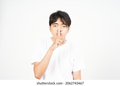 Shh Be Quiet Of Asian Man Isolated On White Background