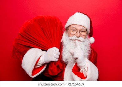 Shh! No sound mute silent confidential, privacy quiet, shush hissing hush concept. Funny santa in headwear, is gesturing keep forefinger by his lips. Holly jolly x mas noel miracles and magic time! - Powered by Shutterstock