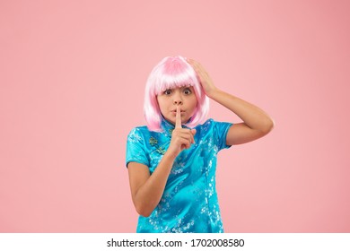 Shh, Stop Talking. Kid Show Silence Sign. Secret And Mysterious. Demand To Be Quiet And Not Tell Secret. Small Girl Show Hush Gesture. Asian Child Keep Fingers On Lips. Keep Private Information.